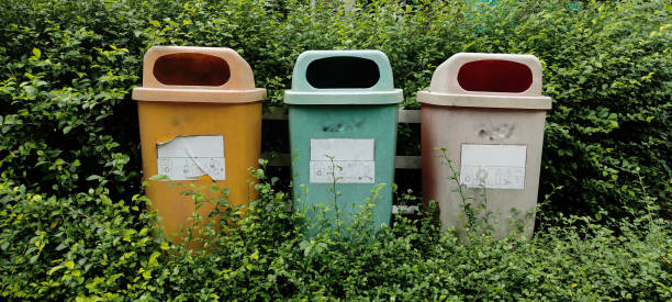 istock a plastic trash can installed in a park, close up view 1473650710