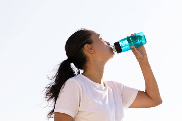 istock Woman Drinking Water 1473651086