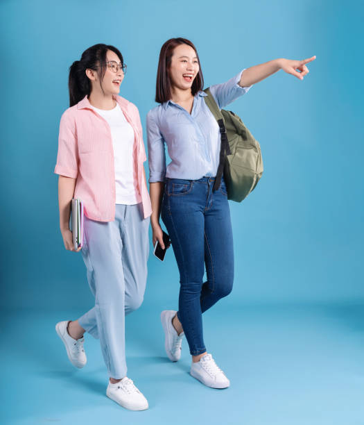 istock Two women on blue background 1473652083