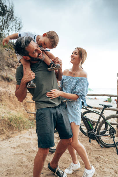 istock family on the beach with son 1473652937