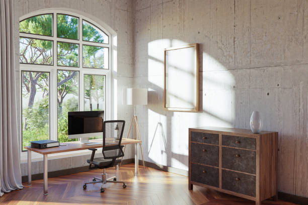 istock comfortable workplace with pc standing on wooden desk in office at home; bright sunlight shines from side through large window; wall with canvas copy space;  remote work freelance concept; 3D Illustration 1473653051