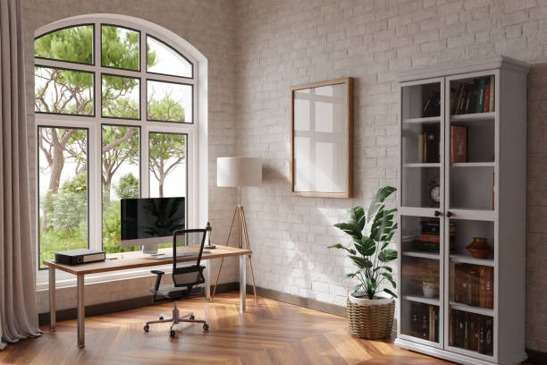 istock comfortable workplace with pc standing on wooden desk in office at home; bright sunlight shines from side through large window; wall; with canvas copy space;  remote work freelance concept; 3D Illustration 1473653209