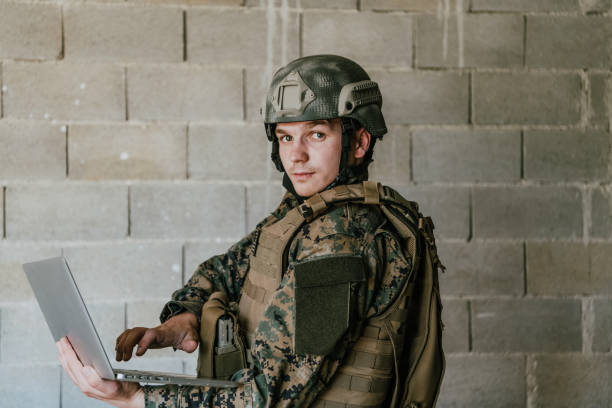 istock American soldier in military uniform using laptop computer for drone controlling and to stay in contact with friends and family 1473653836