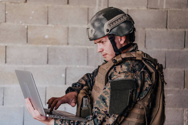 istock American soldier in military uniform using laptop computer for drone controlling and to stay in contact with friends and family 1473653888
