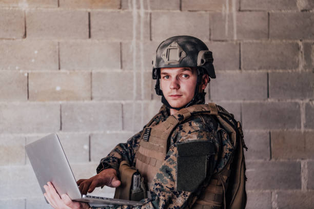 istock American soldier in military uniform using laptop computer for drone controlling and to stay in contact with friends and family 1473653930