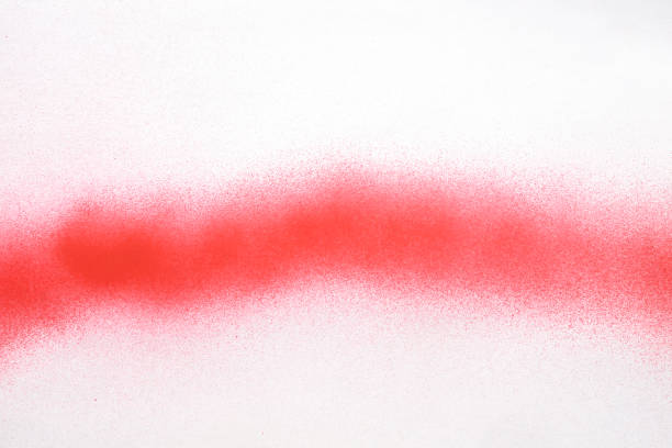 red line of spray paint on white paper