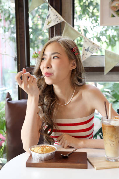 istock Girl in Cafe 1473657155