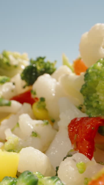 A mixture of vegetables. Juicy healthy food. Cauliflower, broccoli, corn. Vertical, Social Media