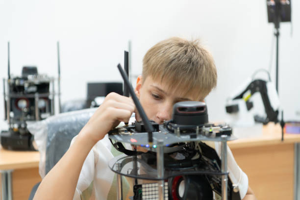 istock Children using the hand robot technology, Students are studying technology, which is one of the STEM courses. 1473663604