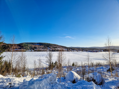 Small person in big winter landscape