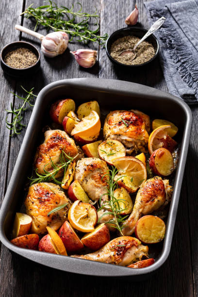 istock Lemon Garlic Chicken with roast potatoes, top view 1473666543