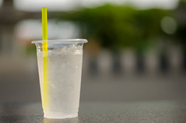Ice cold drinking water in a glass is refreshing. with copy space