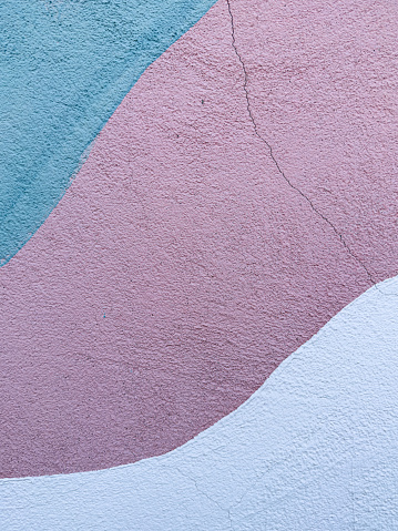 Closeup of colorful urban wall texture. Modern pattern for wallpaper design. Creative urban city background. Abstract open composition. Minimal style, solid colors