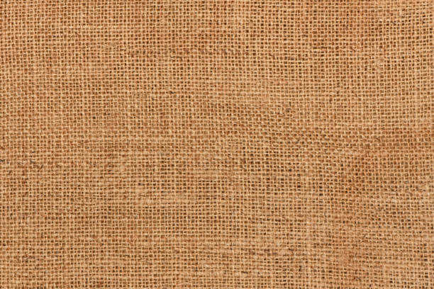 Brown sackcloth linen texture background Brown sackcloth linen texture background and empty space. High resolution photo. Full depth of field. brown university stock pictures, royalty-free photos & images