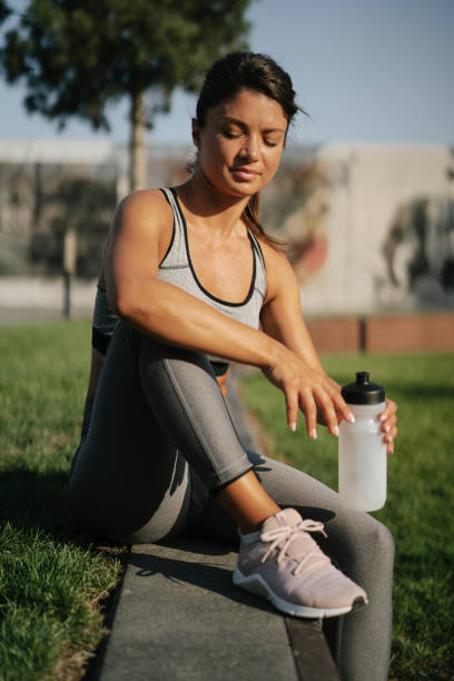 istock Happy girl resting after training. 1473669796