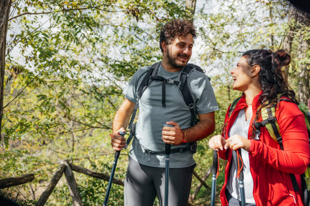 istock Young couple go for a hike up the hills 1473671251