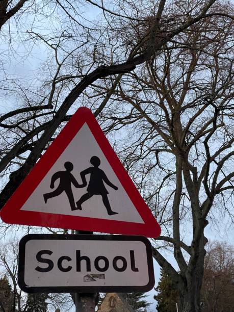 istock School crossing ahead road sign 1473676387