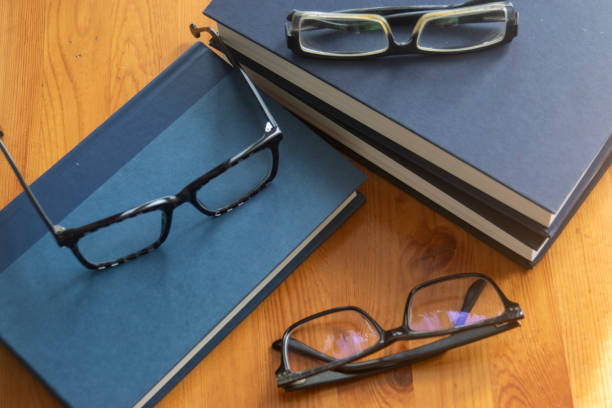 Books and glasses stock photo