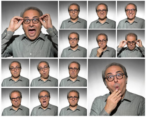 Close up photo of cheerful boy learner first time wear glasses enjoy rejoice look camera isolated on yellow color background.