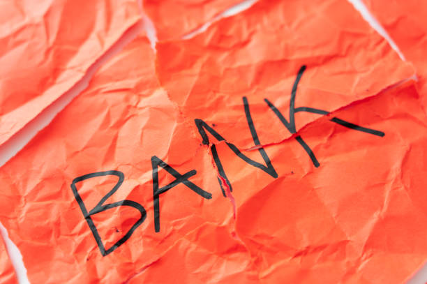 istock Crumpled sheet with written Bank. 1473681288