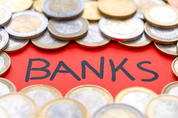istock Word Bank, with coins around it. 1473681488