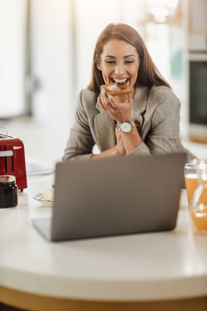 istock Woman Enjoying Breakfast At Home 1473682917