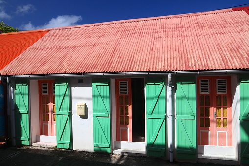 Terre de Haut town in Les Saintes, Guadeloupe. Typical local Creole style painted colorful wooden architecture.