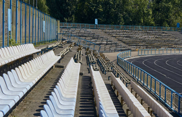 istock Treadmill with white lines at the stadium. Running tracks with marking. 1473684867