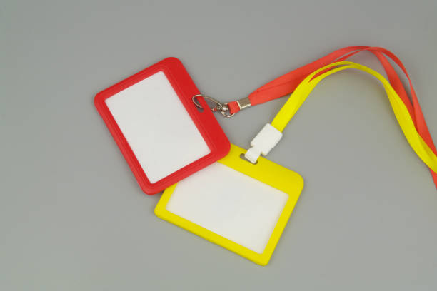 istock Yellow and red badges with ropes on gray background. 1473686063