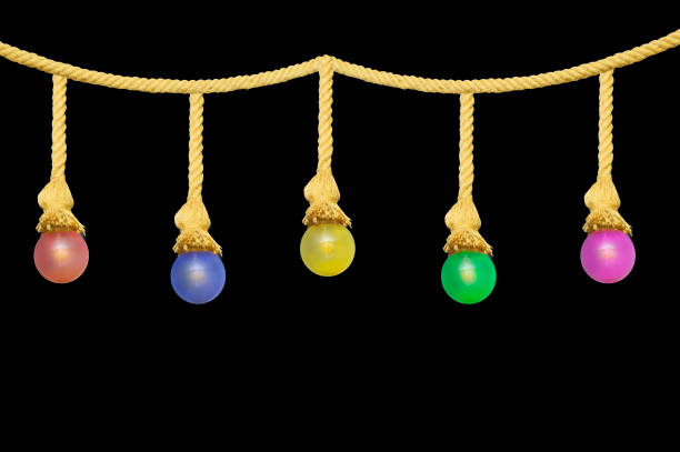 istock Garland of multi-colored electric bulbs isolated on a black background. 1473686080