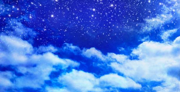 istock bright blue and twinkling stars, fantastic landscape image above the clouds 1473687668