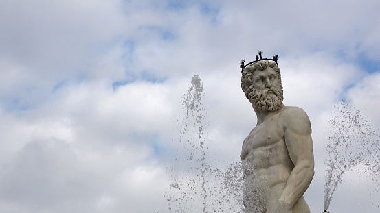 Fountain of Neptune in Piazza della Signoria, main square in Florence, Italy. Historic tourist attraction of Tuscany, Italy.