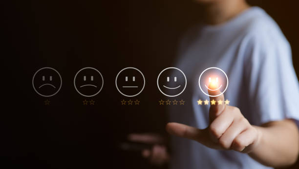 istock Customer service evaluation concept. User pressing smile face emoticon on virtual touch screen. quality review, feedback survey, best rating positive five star, marketing research, satisfaction client 1473689459