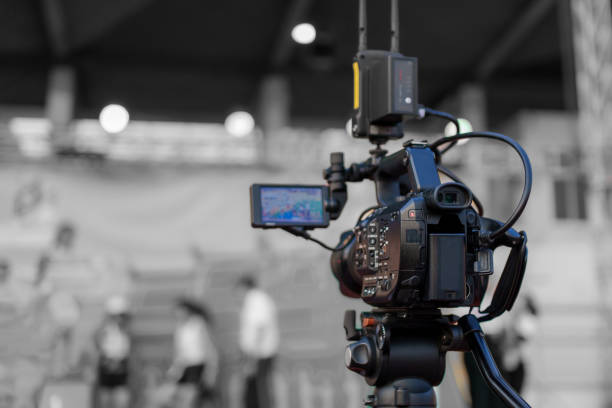 istock Video camera operator Professional camera filming a video podcast 1473689669