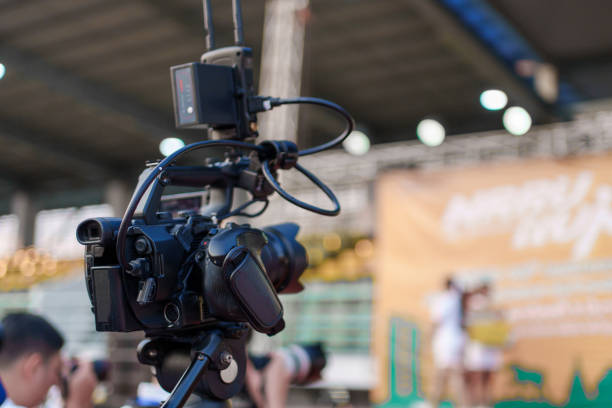 istock Video camera operator Professional camera filming a video podcast 1473689674