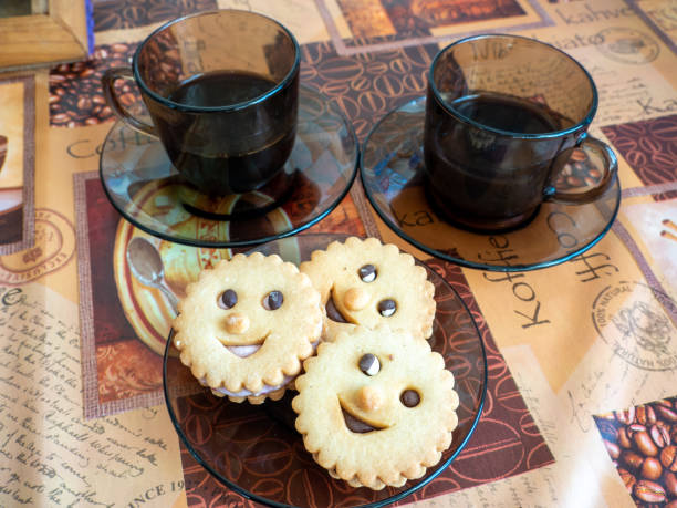 istock cup of black coffee with biscuits, breakfast concept 1473691173