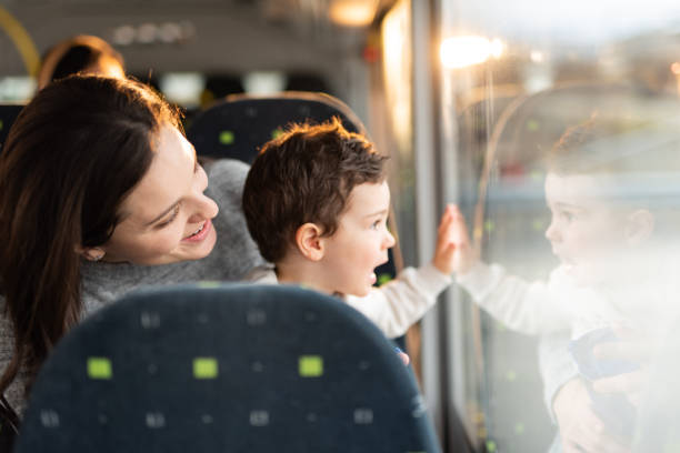 istock Mother and son traveling by bus 1473699986