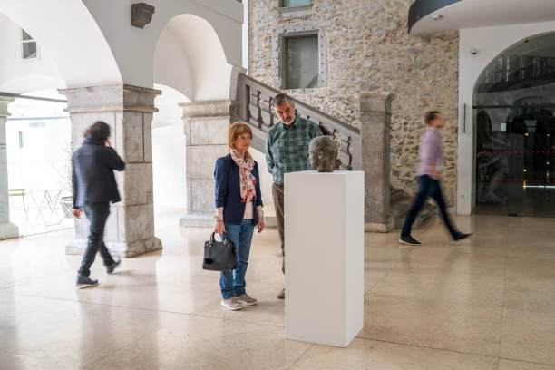 istock Charming Female and Male Museum Guests 1473709866