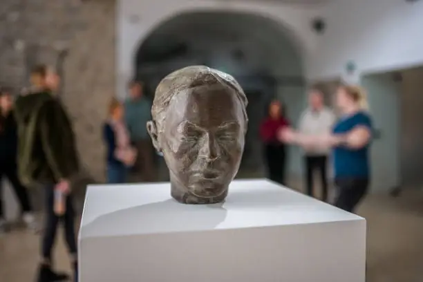 Photo of Bronze Head on Display at the Museum