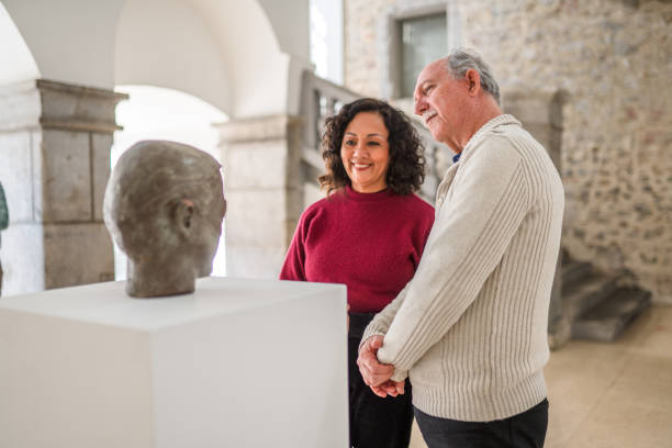 istock Romantic Heterosexual Couple at an Art Expo 1473709907