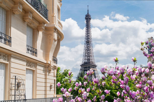 istock eiffel tour and Paris street 1473710337