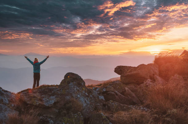 istock Lone tourist meets mountain sunset 1473712867
