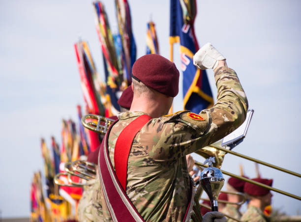 82nd Airborne Ceremonial Band on Stang Field, Fort Bragg, North Carolina. Close-up of white-gloved master musician signaling the band stock photo