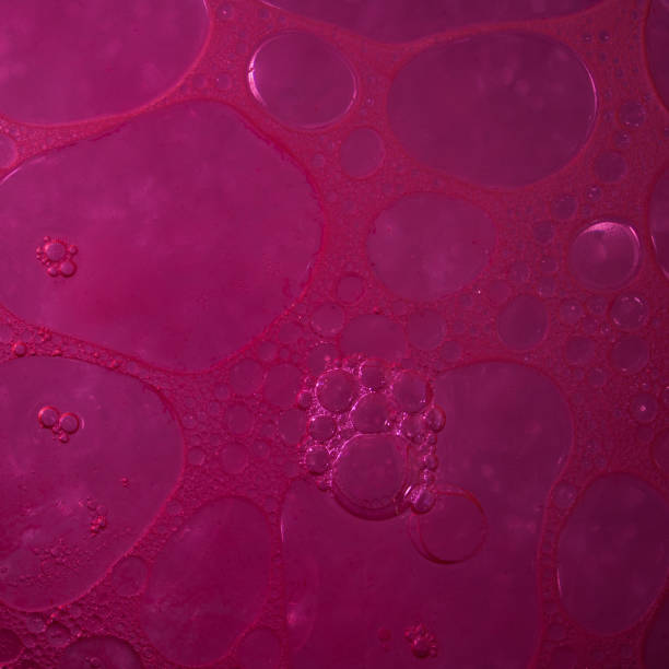istock purple bubbles of various shapes and sizes in an abstract image 1473716196