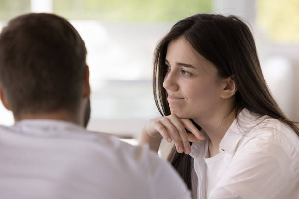 istock Pretty girl feeling boredom, doubt during dating 1473718584