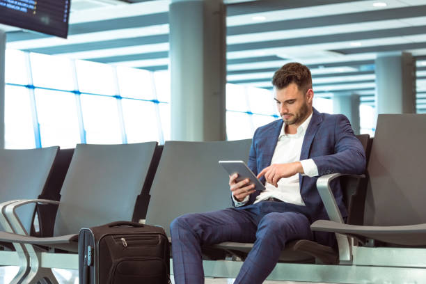 istock Businessman waiting for the flight 1473719741