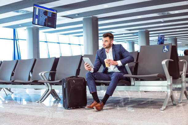 istock Businessman waiting for the flight 1473719840