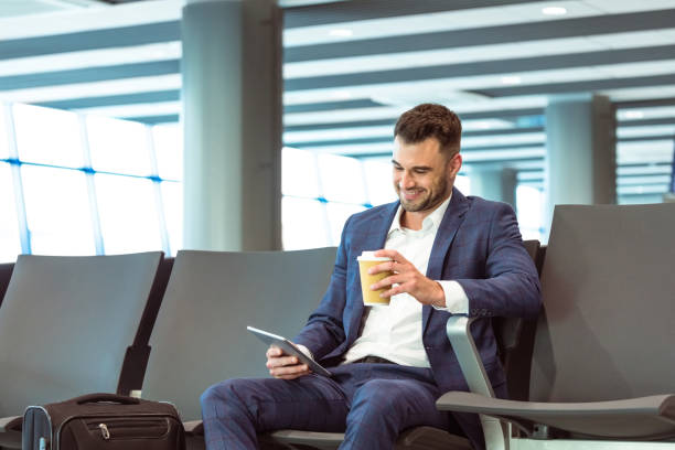 istock Businessman waiting for the flight 1473719895