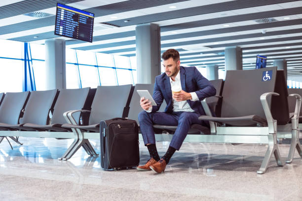 istock Businessman waiting for the flight 1473719930