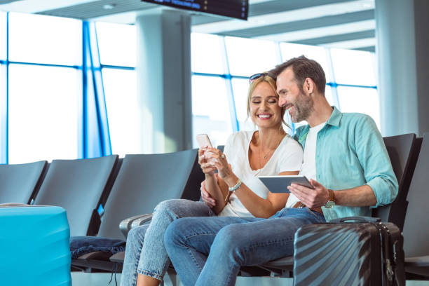istock Couple waiting for the flight 1473720157